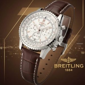 Breitling Watch With a Silver Dial and Brown Leather Strap